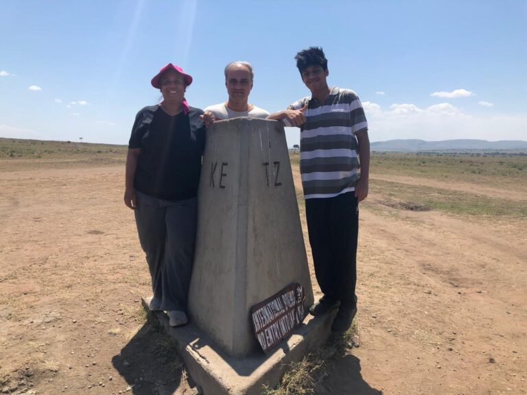Safari Lab guests at the Kenya Tanzania border during their Masai Mara journey