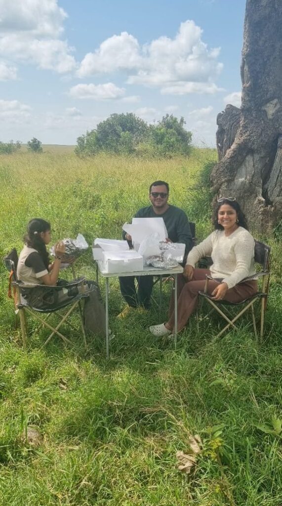 Safari Lab guests enjoying a picnic breakfast in the Masai Mara